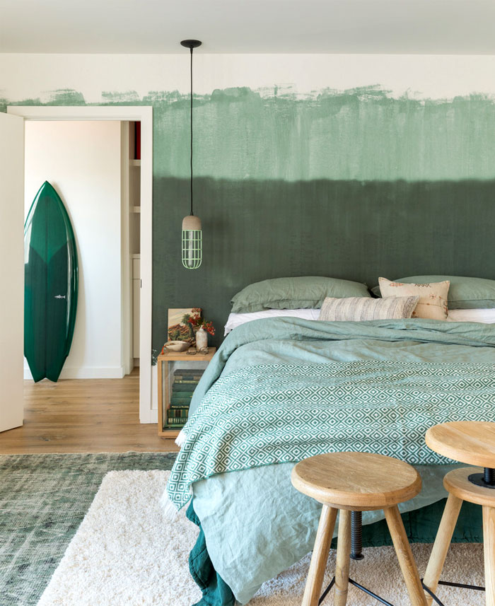 green wall decor bachelor bedroom